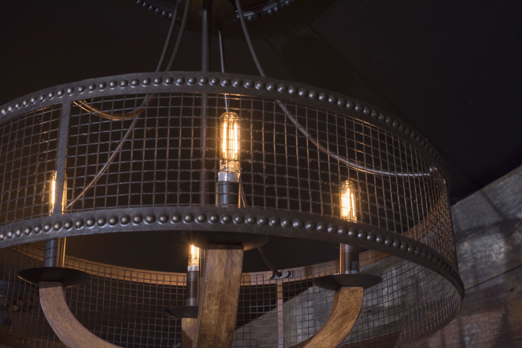 tubular kibun lighting in a wire frame chandelier